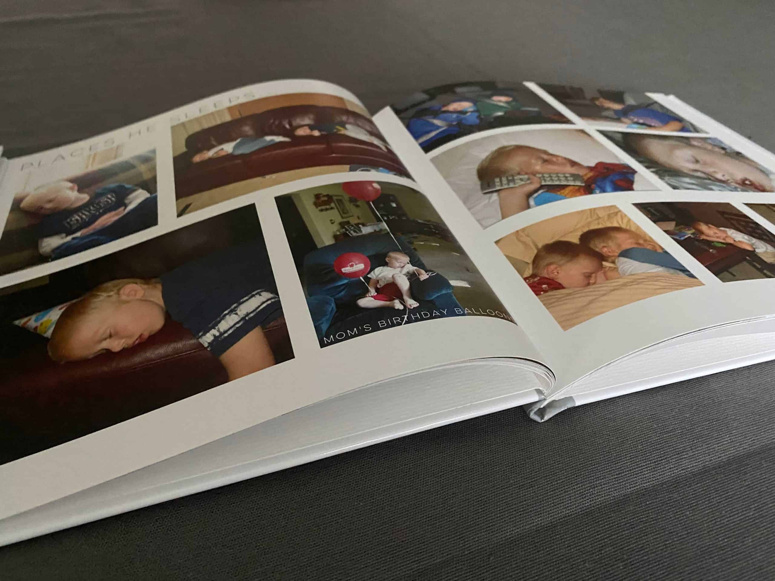 Photo book opened on table 